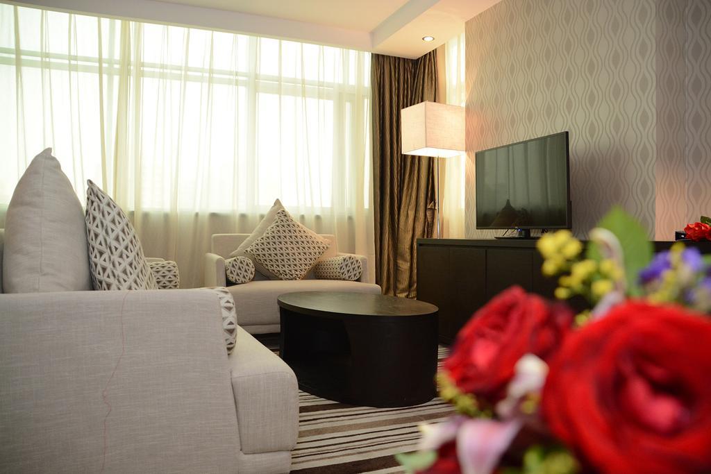 Dongguan Junyue Hotel Zimmer foto