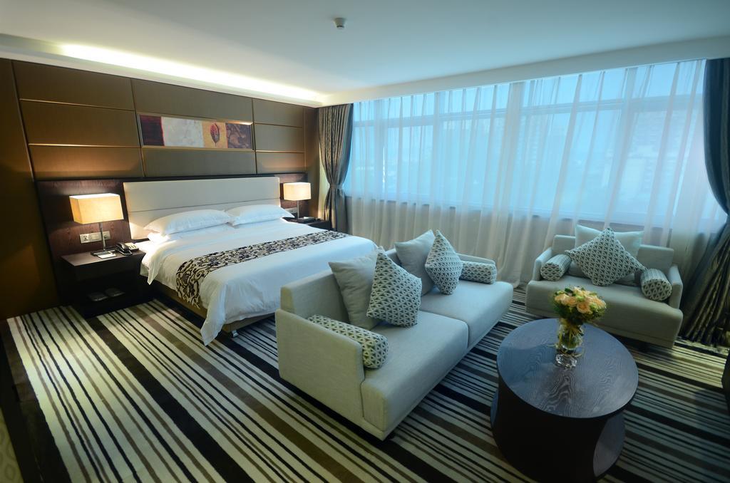 Dongguan Junyue Hotel Zimmer foto