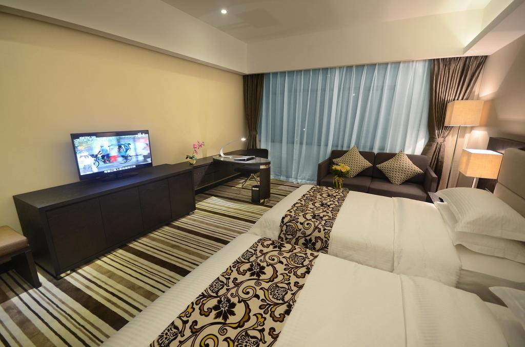 Dongguan Junyue Hotel Zimmer foto