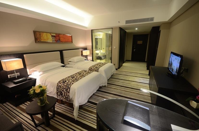 Dongguan Junyue Hotel Zimmer foto